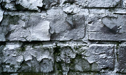 Brick Close-Up Dirty Grunge Metallic Paint Peeling Shiny Silver Spray Wall